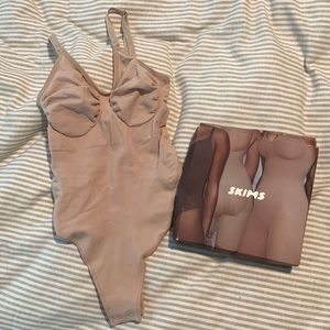 SKIMS sculpted thong bodysuit NWT.